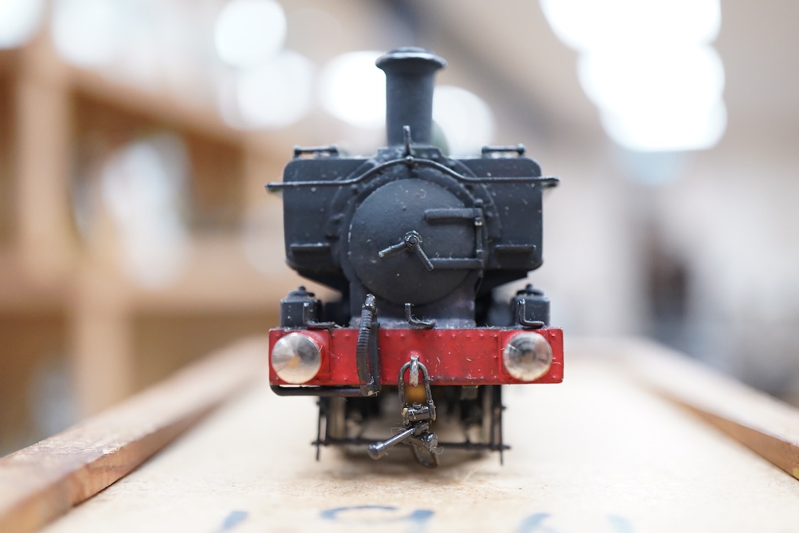 Two EM gauge scratch built model railway GWR locomotives by John Worsley, an 0-6-0PT, 1961, and an 0-6-0ST, 2007, both detailed models with opening smoke box doors showing the details of the blast pipe and boiler tube en